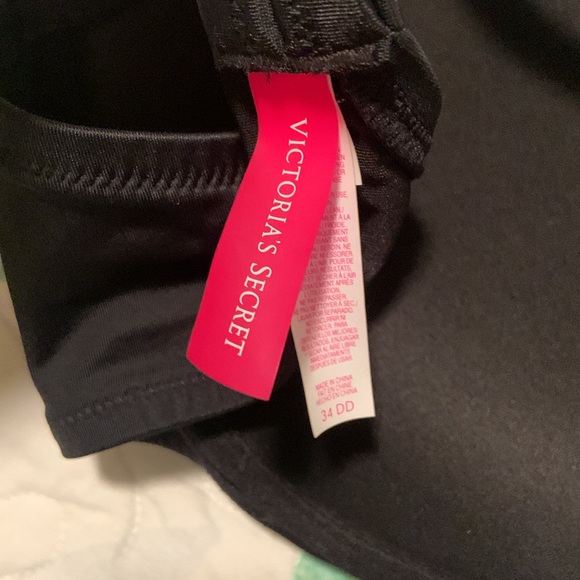 Victoria’s Secret push up bikini top. Black and white with gold accent. - Picture 5 of 6